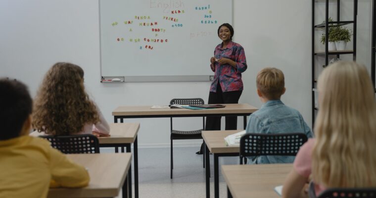 teacher smiling at her students