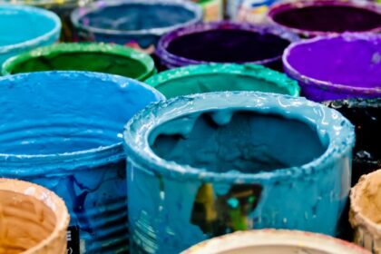 assorted color paint buckets